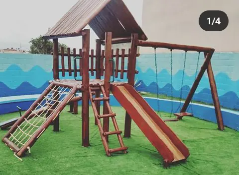 Casa do Tarzan no showroom PHD — detalhe da madeira de eucalipto autoclave